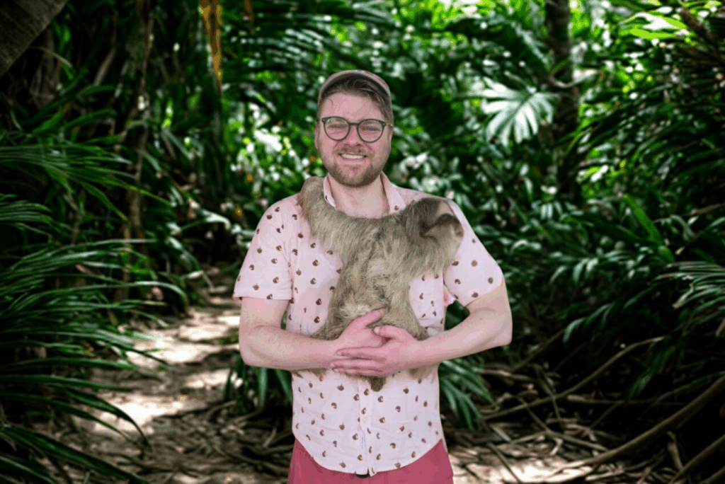 Meeting Convenor Billy holding a cute sloth