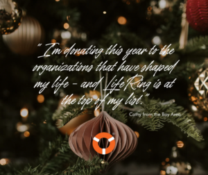 Cathy Donates To LifeRing - LifeRing Secular Recovery Image of Lifering Logo amid holiday festive decorations