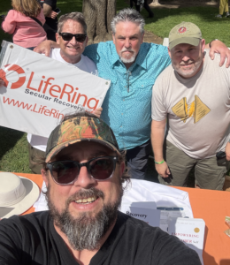 Four men promoting LifeRing at a National Recovery Month 2026 event.